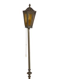 A Pair of Patinated Metal Lantern Style Floor Lamps
