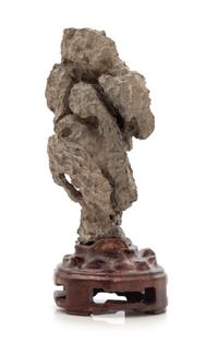 A Chinese Ying Scholar's Rock Height overall 7 inches. — 20TH CENTURY