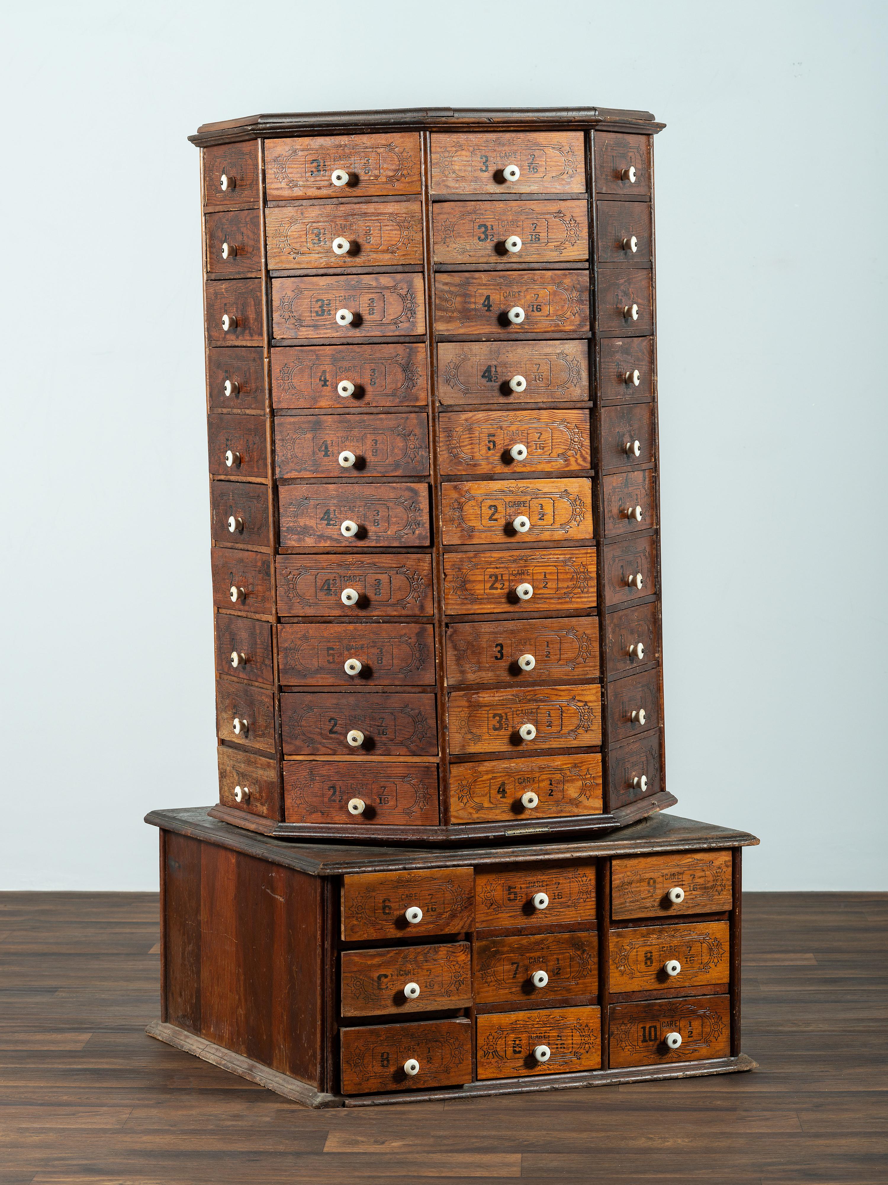 An American Bolt and Screw Case Company Stenciled Pine Octagonal Rotating Cabinet
