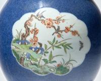 A Chinese porcelain three-piece garniture, 19th century and later