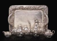 An impressive Japanese export silver four-piece "Dragon" tea and coffee service with tray, retailed by Arthur & Bond, Yokohama, late 19th/early 20th century 日式銀質咖啡器茶具四件及托盤 十九世紀末或二十世紀初