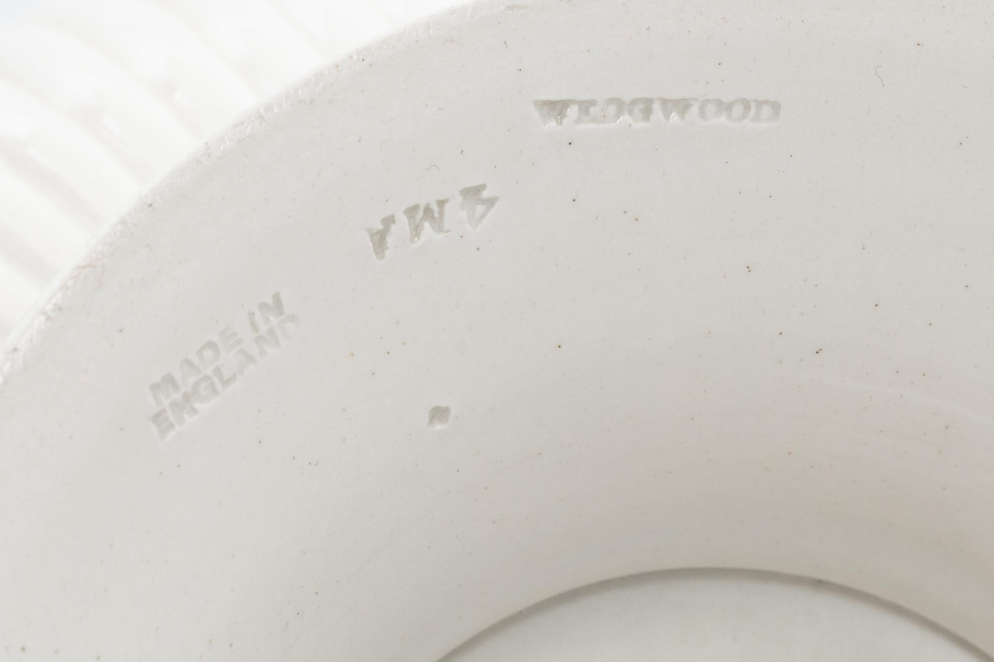 A Wedgwood Bisque Pottery Three-Piece Garniture