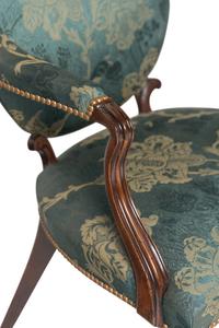 A Pair of George III Mahogany Armchairs