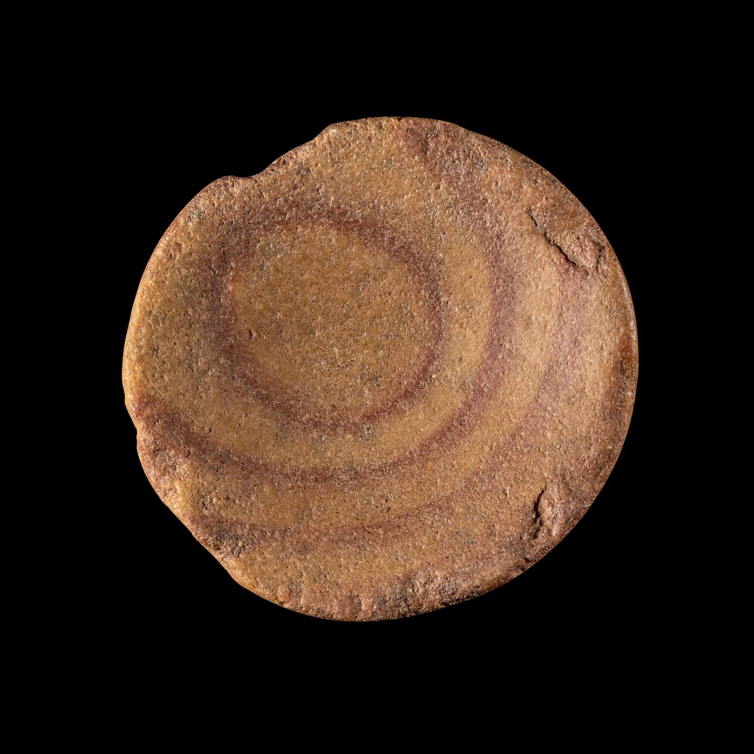 A Neolithic Quartzite Palette