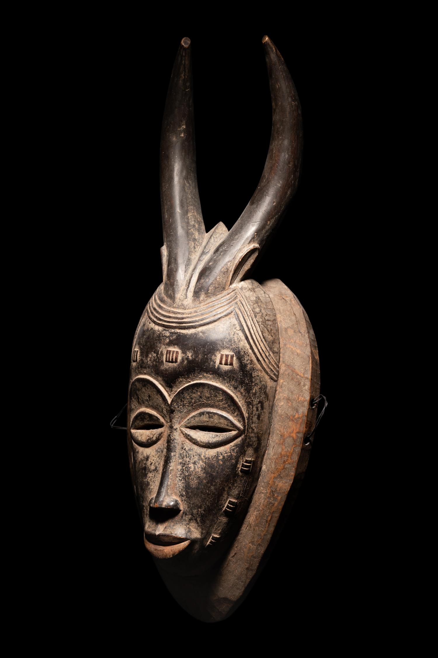 Two Baule Wood Masks