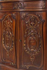 An Italian Carved Walnut Marble-Top Cabinet in the Louis XV Taste