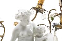 A Gilt Metal Mounted White Glazed Porcelain Figural Group after Clodion Mounted as a Lamp