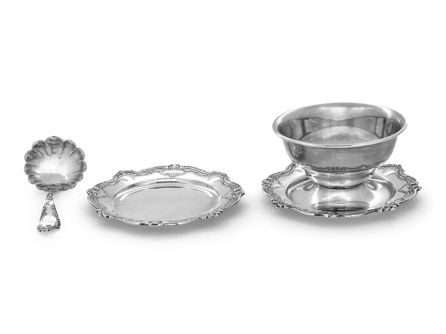 comprising a bowl with attached underplate, ladle and plate, 3 items total.