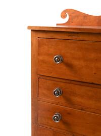 A Late Classical Carved Cherrywood Chest of Drawers