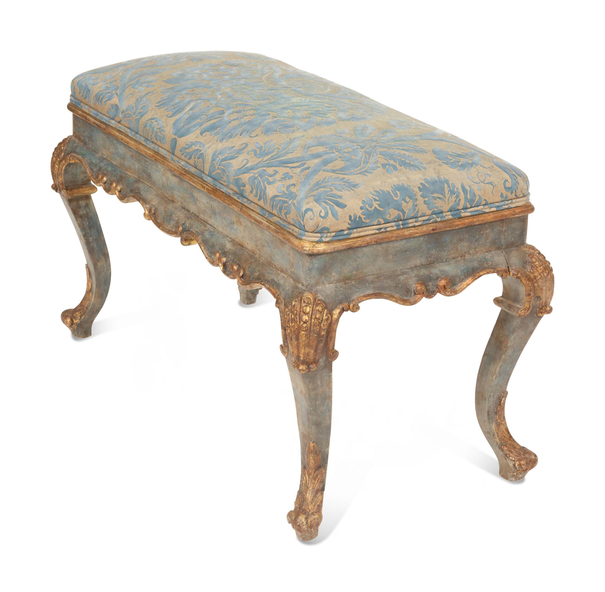 An Italian Painted and Parcel Gilt Bench with Fortuny Upholstery