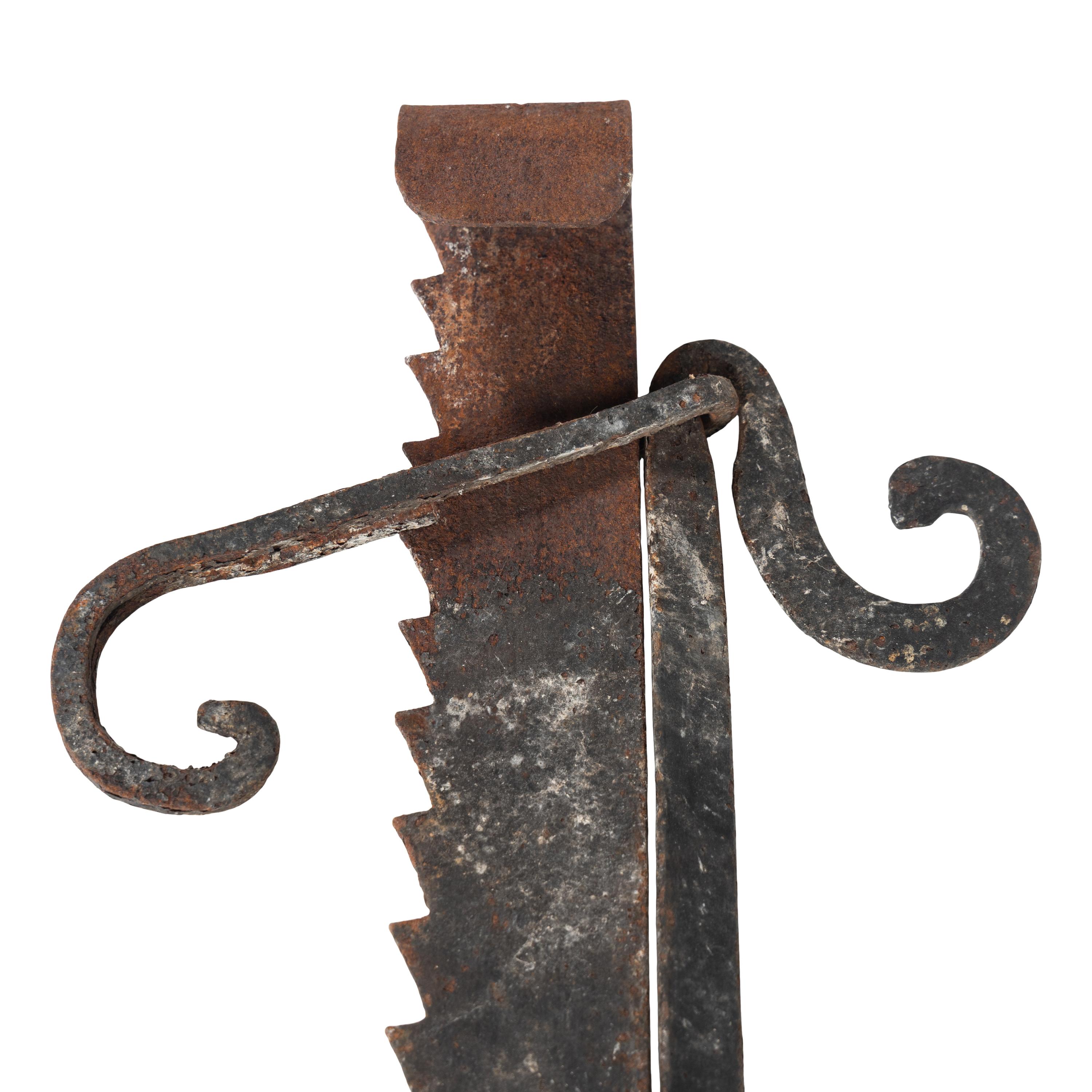 A French Hand-Forged Iron Crémaillère de Cheminée
