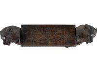 A Black Forest Carved Figural Hall Bench