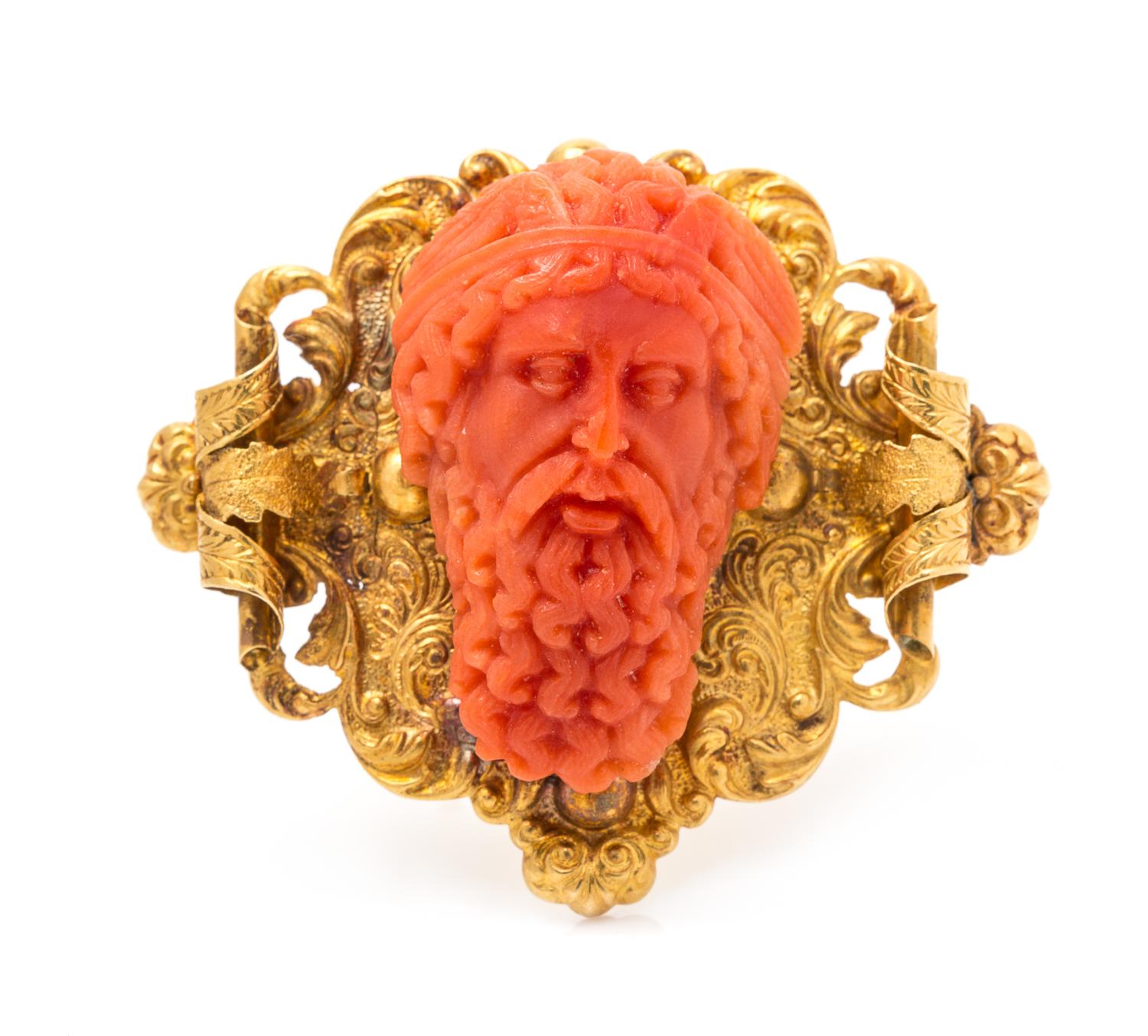 A Victorian Yellow Gold and Carved Coral Cameo Brooch, 7.00 dwts.