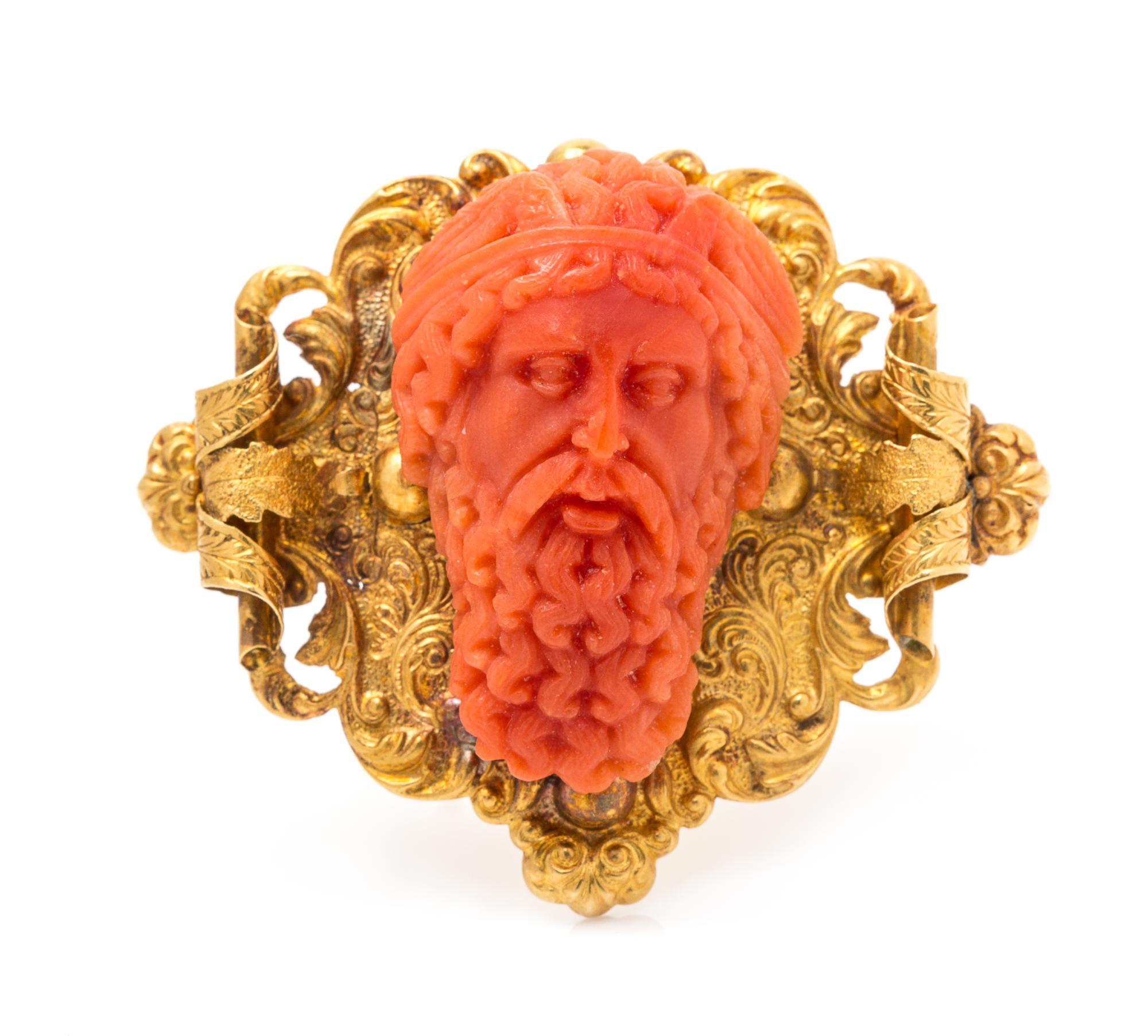 A Victorian Yellow Gold and Carved Coral Cameo Brooch, 7.00 dwts.