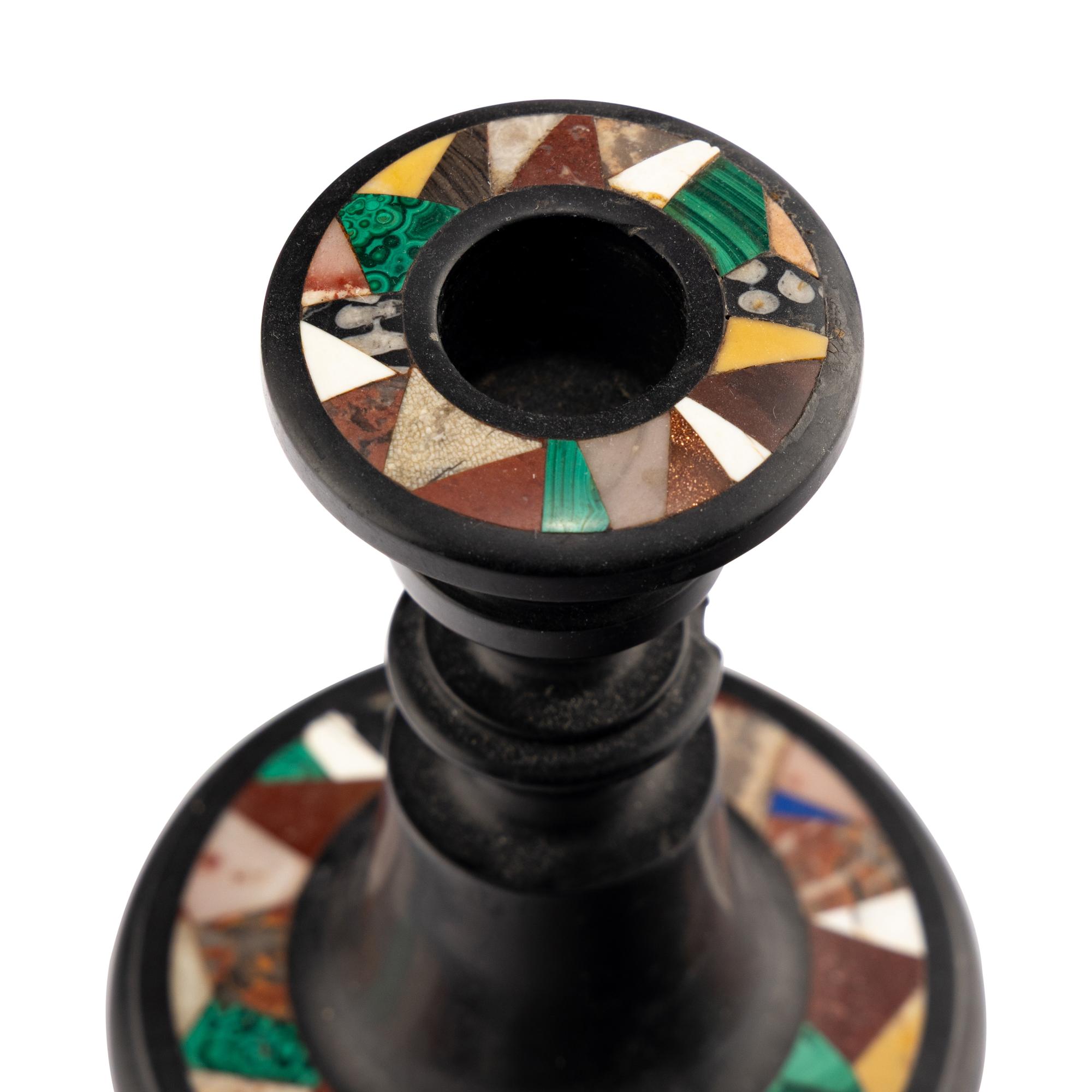 Seven Specimen Marble Candlesticks