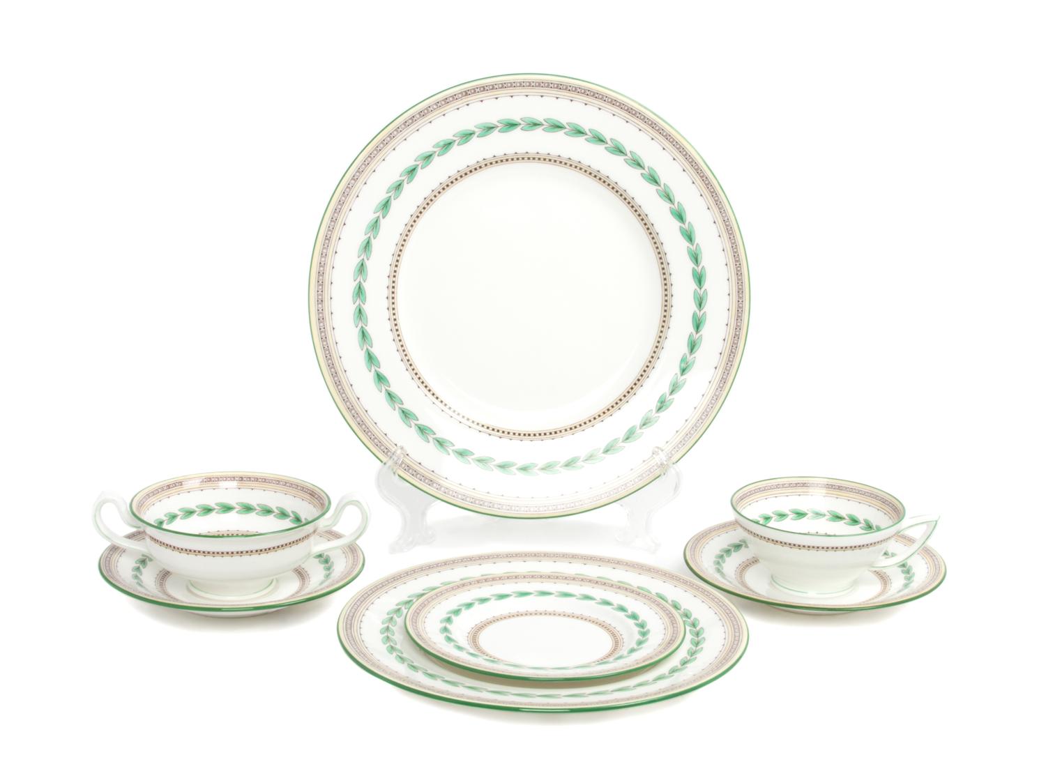 A Minton Porcelain Dinner Service for Twelve Diameter of first 10 5/8 inches. — 20TH CENTURY