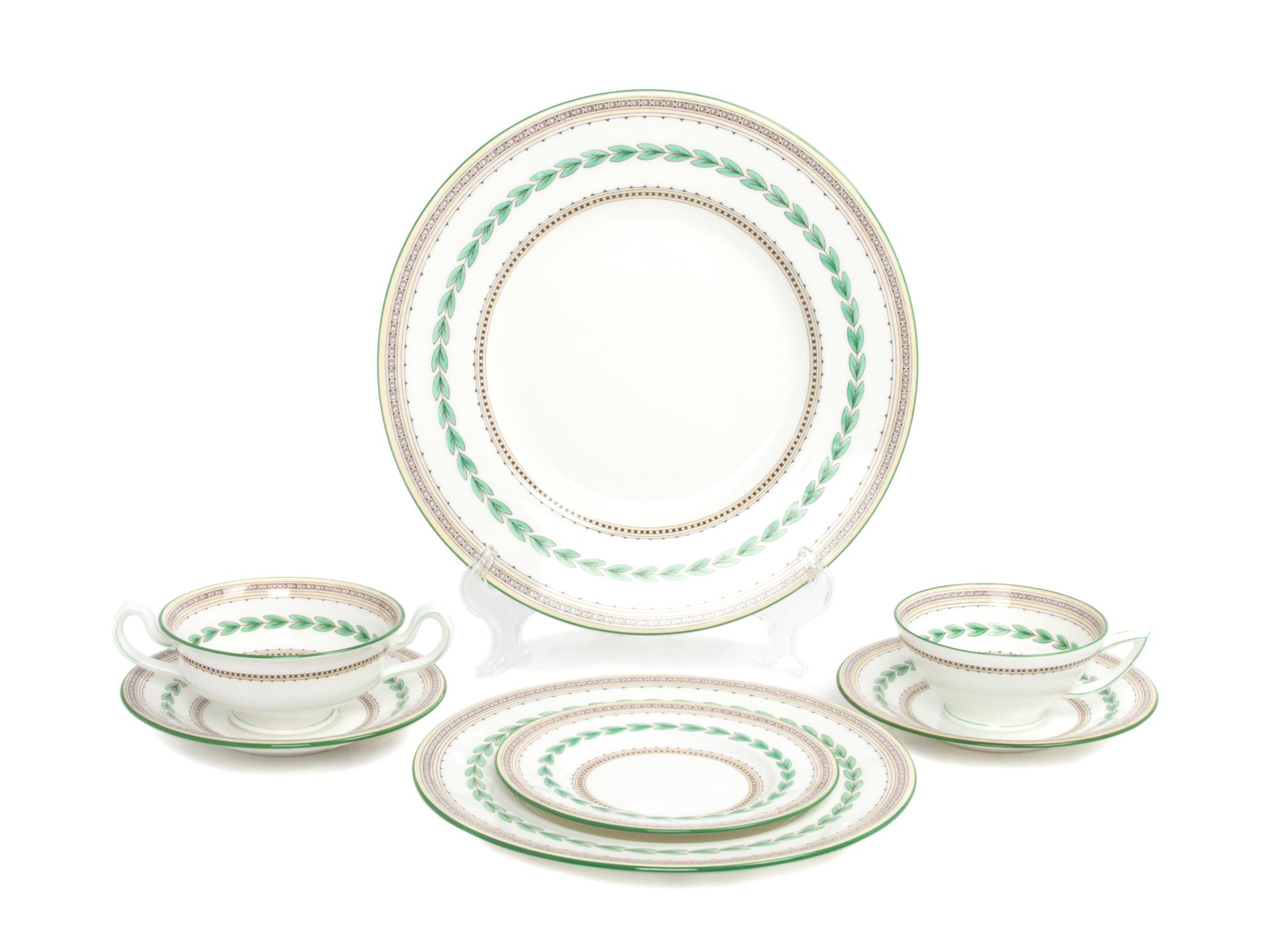 A Minton Porcelain Dinner Service for Twelve Diameter of first 10 5/8 inches. — 20TH CENTURY