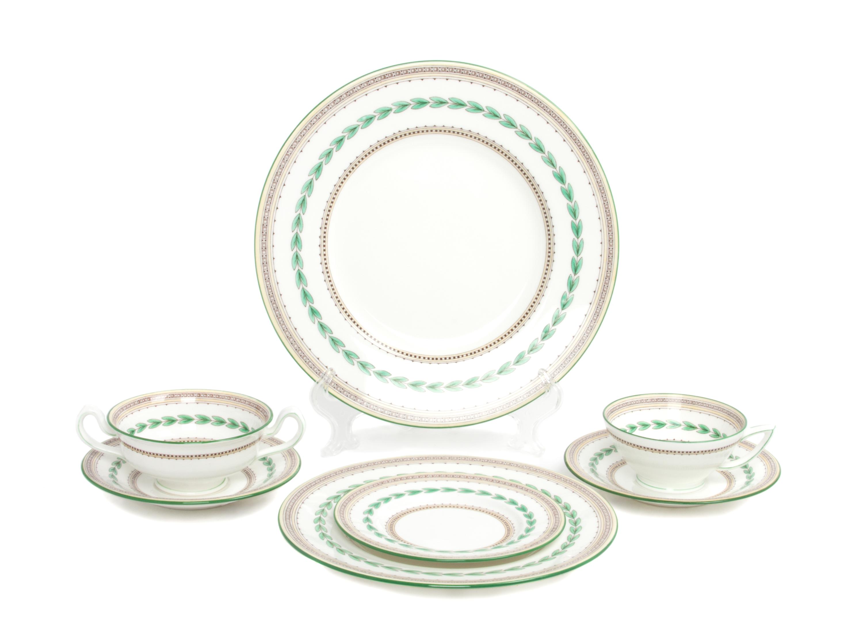 A Minton Porcelain Dinner Service for Twelve Diameter of first 10 5/8 inches. — 20TH CENTURY