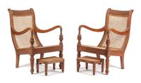 A Pair of Anglo-Colonial Caned Armchairs Height of armchair 39 x width 26 x depth 34 inches. — 19TH CENTURY