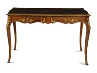 A Louis XV Style Gilt Metal Mounted Walnut Bureau Plat