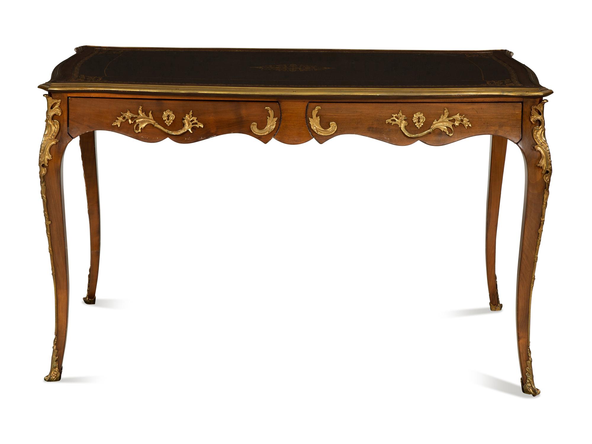 A Louis XV Style Gilt Metal Mounted Walnut Bureau Plat