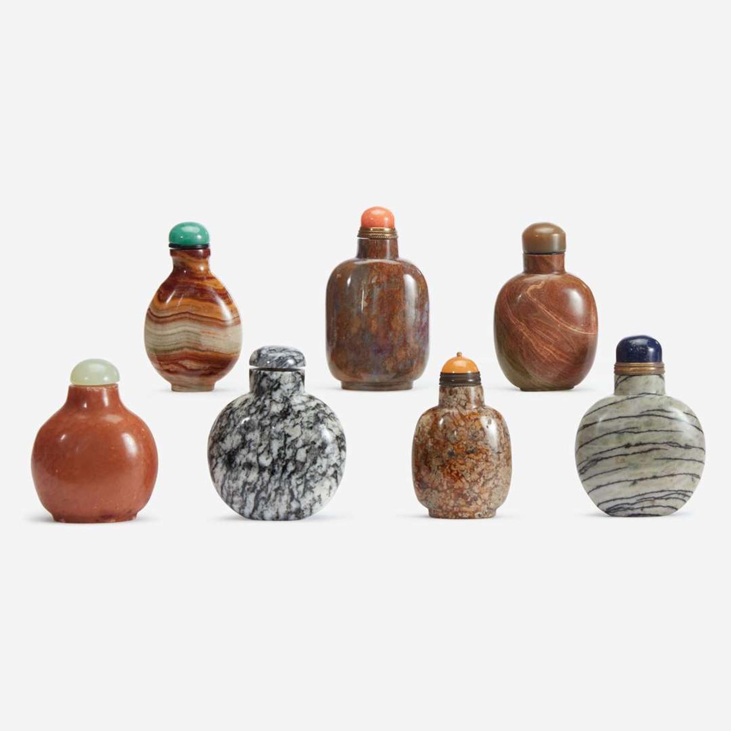 An assorted group of seven Chinese hardstone snuff bottles
