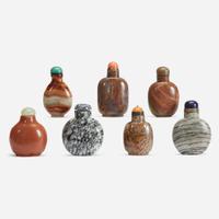An assorted group of seven Chinese hardstone snuff bottles
