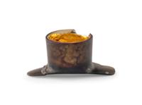 An Aztec Gold-Gilt Obsidian Labret