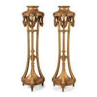 A Pair of George III Style Giltwood Torchères