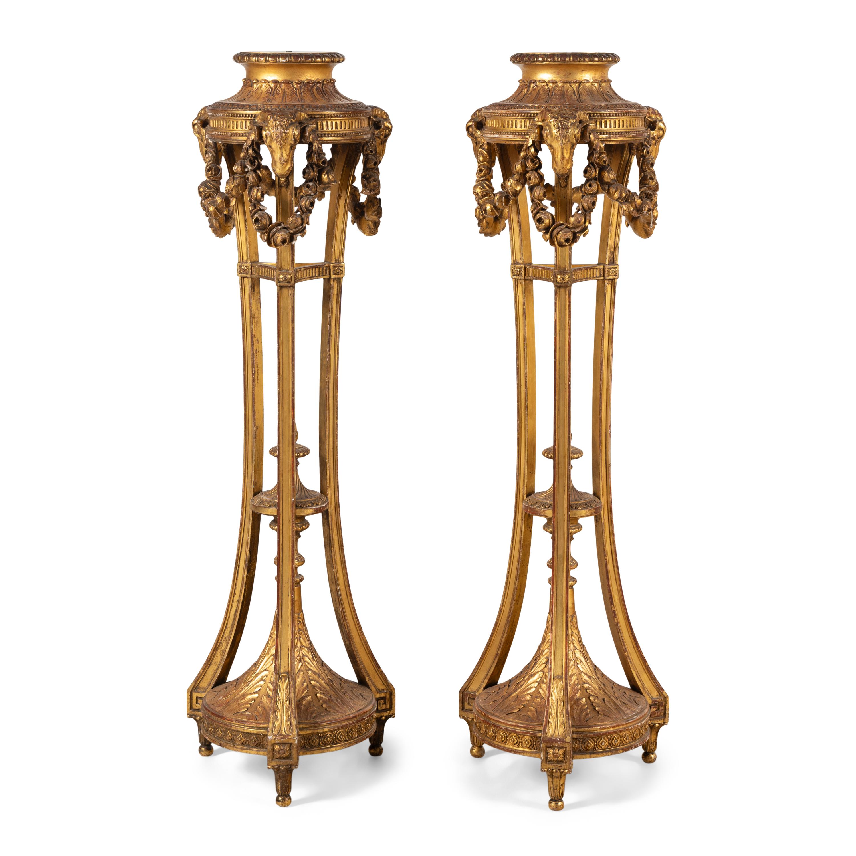 A Pair of George III Style Giltwood Torchères