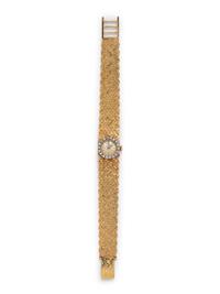 A 14 Karat Bicolor Gold and Diamond Wristwatch, Andre Bonnard,