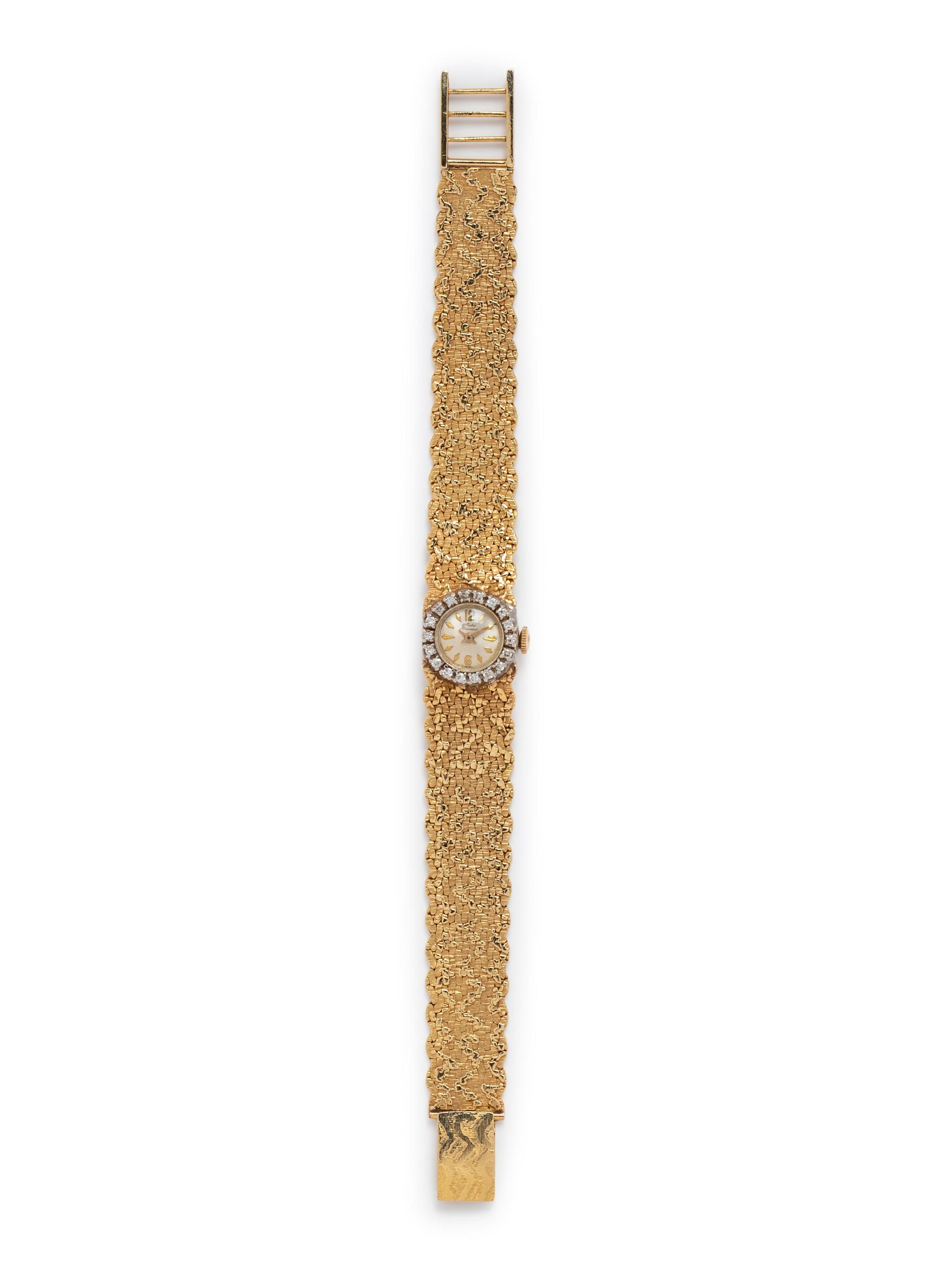 A 14 Karat Bicolor Gold and Diamond Wristwatch, Andre Bonnard,