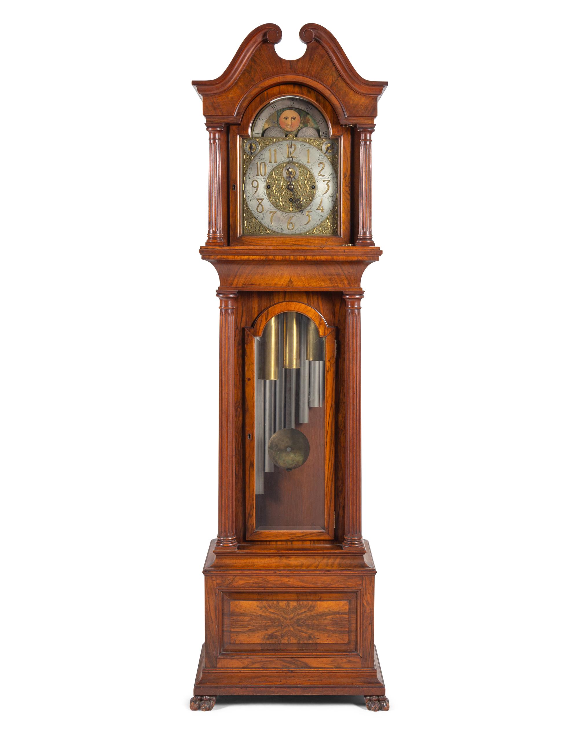 An Elliott Walnut Nine-Tube Tall Case Clock