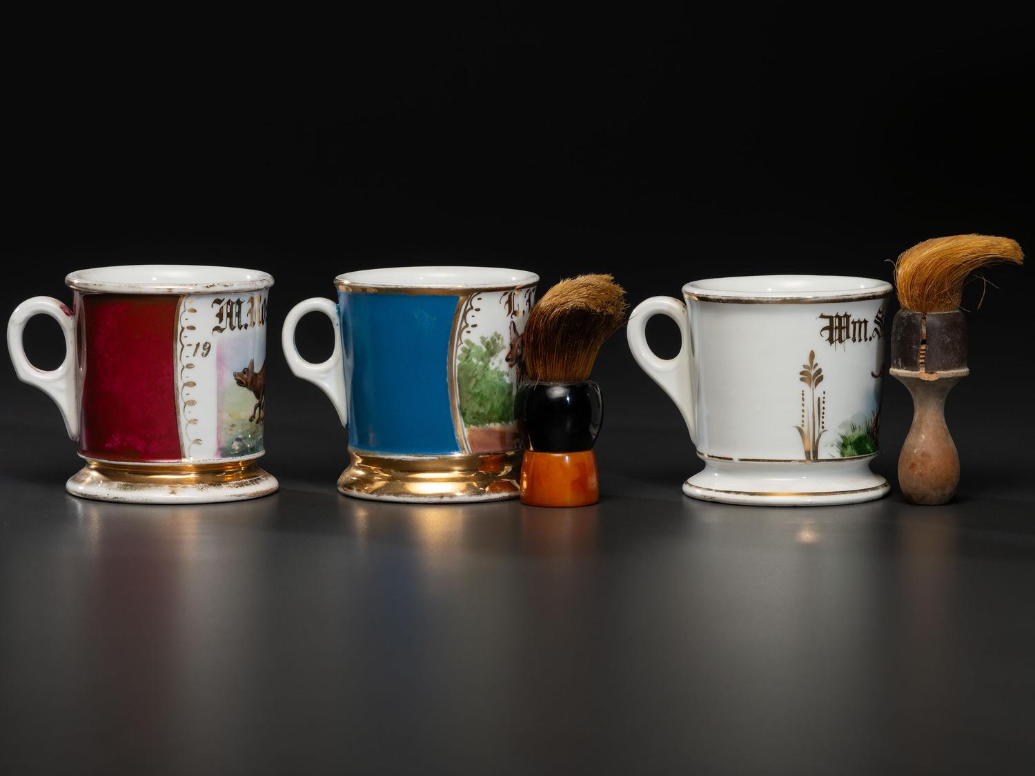 Three Porcelain Shaving Mugs with Animals