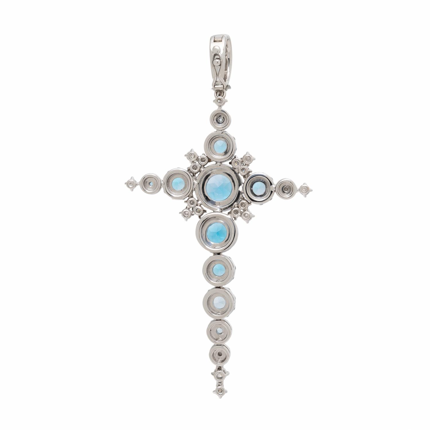 Blue Topaz, Diamond, and White Gold Articulated Cross Pendant