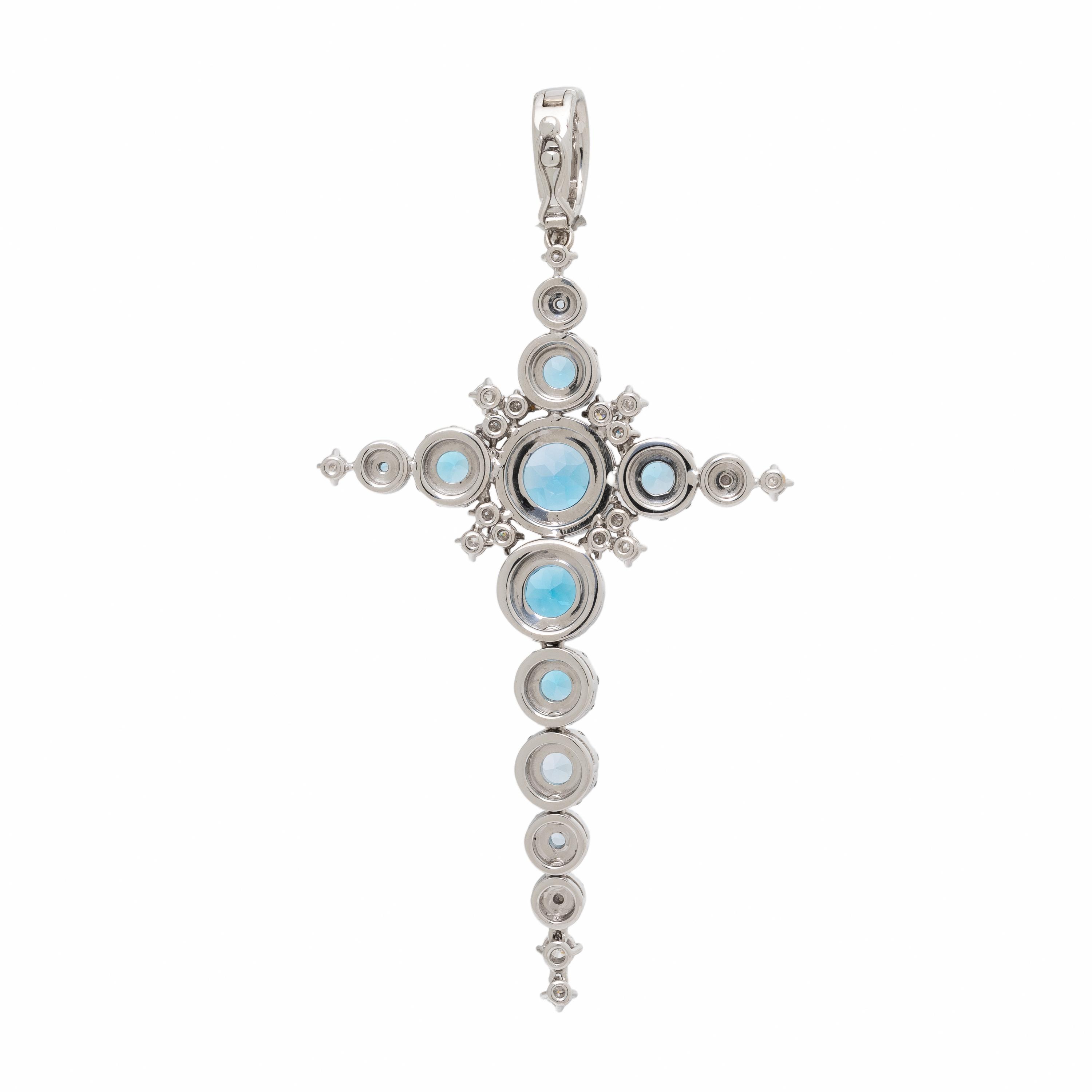 Blue Topaz, Diamond, and White Gold Articulated Cross Pendant