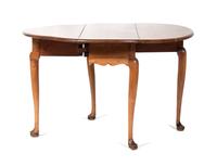 A Drop-Leaf Table Height 27 1/2 inches.