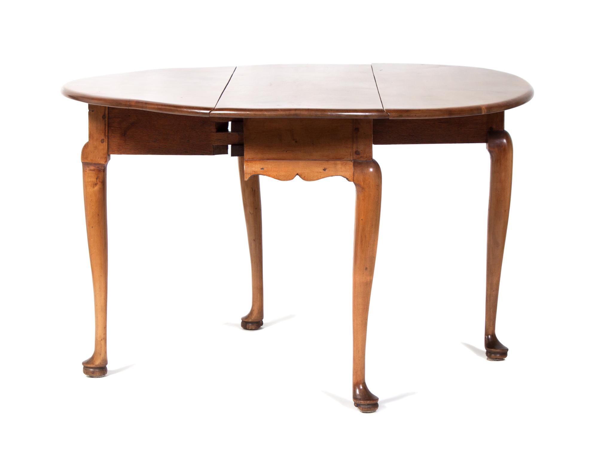 A Drop-Leaf Table Height 27 1/2 inches.