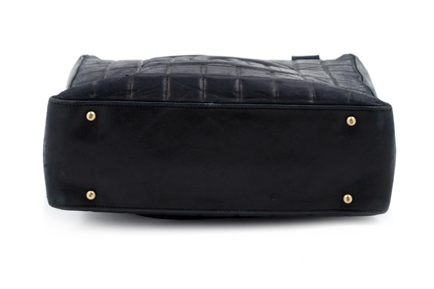 A Chanel Black Lambskin "Chocolate Bar" Tote, 8" H x 10" W x 3.25" D; Strap drop: 9".