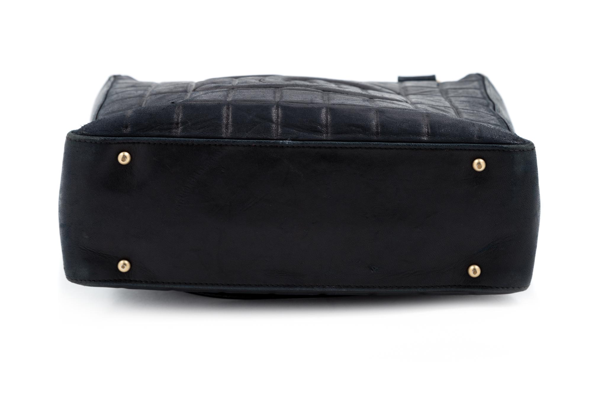 A Chanel Black Lambskin "Chocolate Bar" Tote, 8" H x 10" W x 3.25" D; Strap drop: 9".