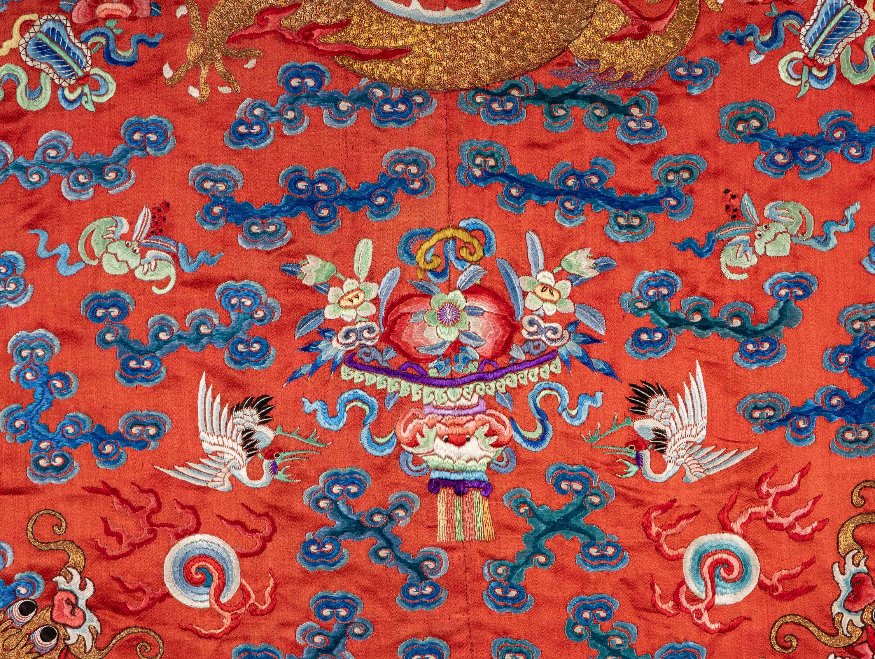 A Chinese Red Ground Embroidered Silk Dragon Robe, Late 19th-20th Century 晚清-民國 紅緞地龍袍
