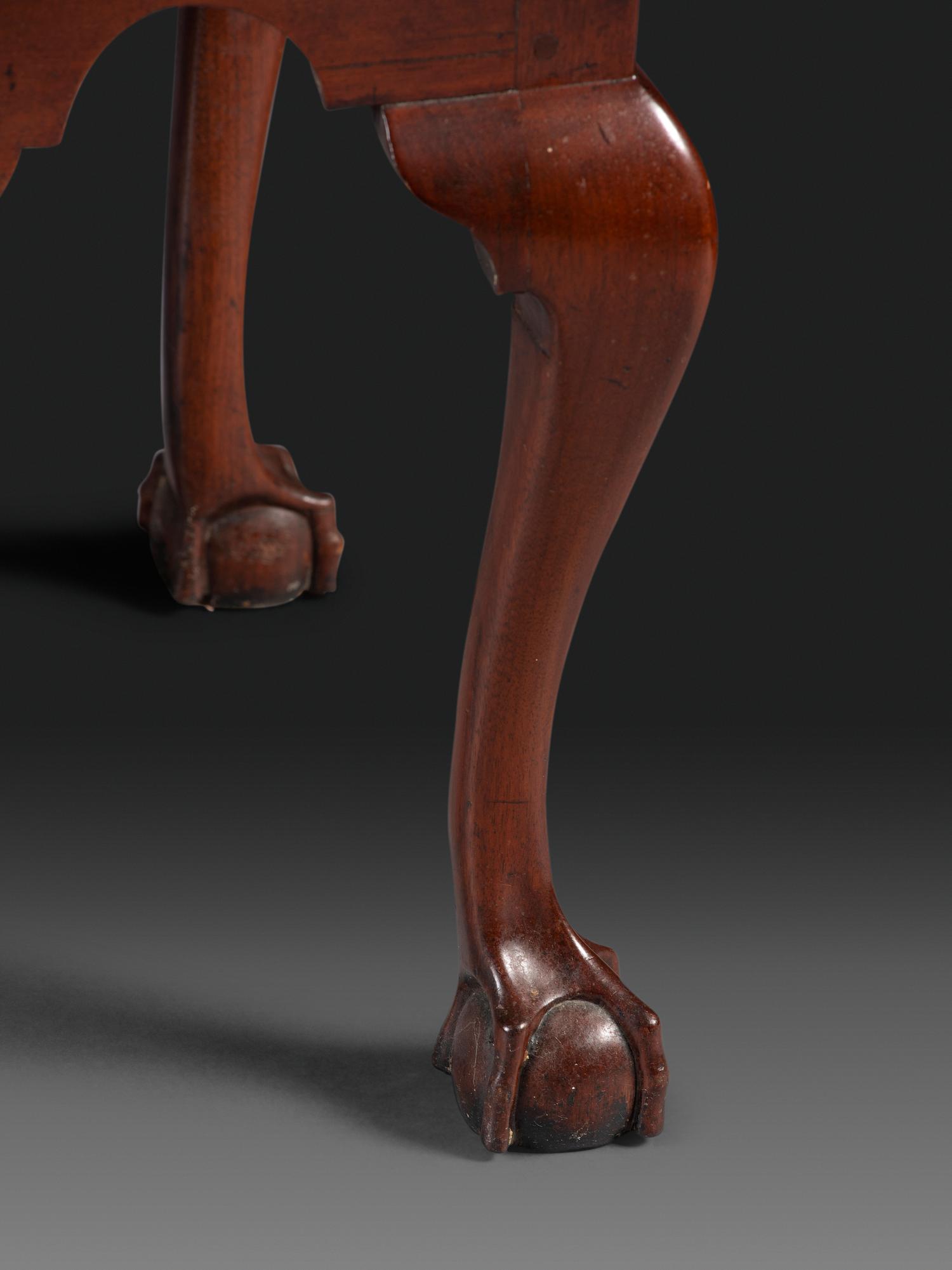 A Chippendale Fan-Carved Walnut Claw-and-Ball Foot Dressing Table