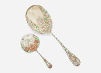 An assembled group of nine sterling silver floral repousse serving utensils, various makers, including Bailey Banks & Biddle Co. and J.E. Caldwell & Co., Philadelphia, PA, and The James R. Armiger Co., Baltimore, MD, and others, late 19th / early 20th century