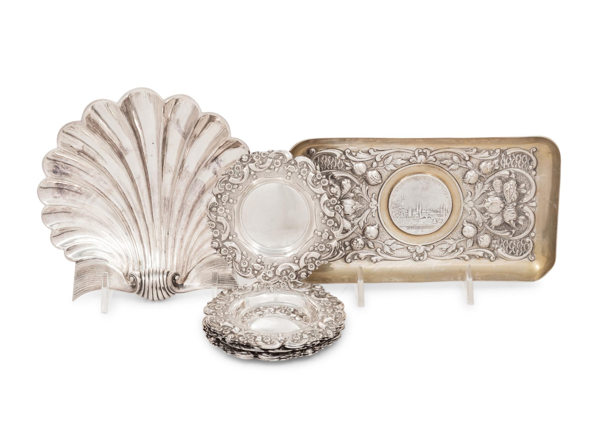A German Silver Coin-Inset Tray and a Silver Shell-Form Dish