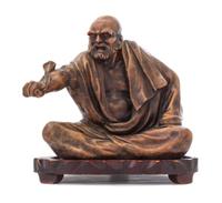 A Soapstone Figure of a Luohan Height 10 1/4 inches.