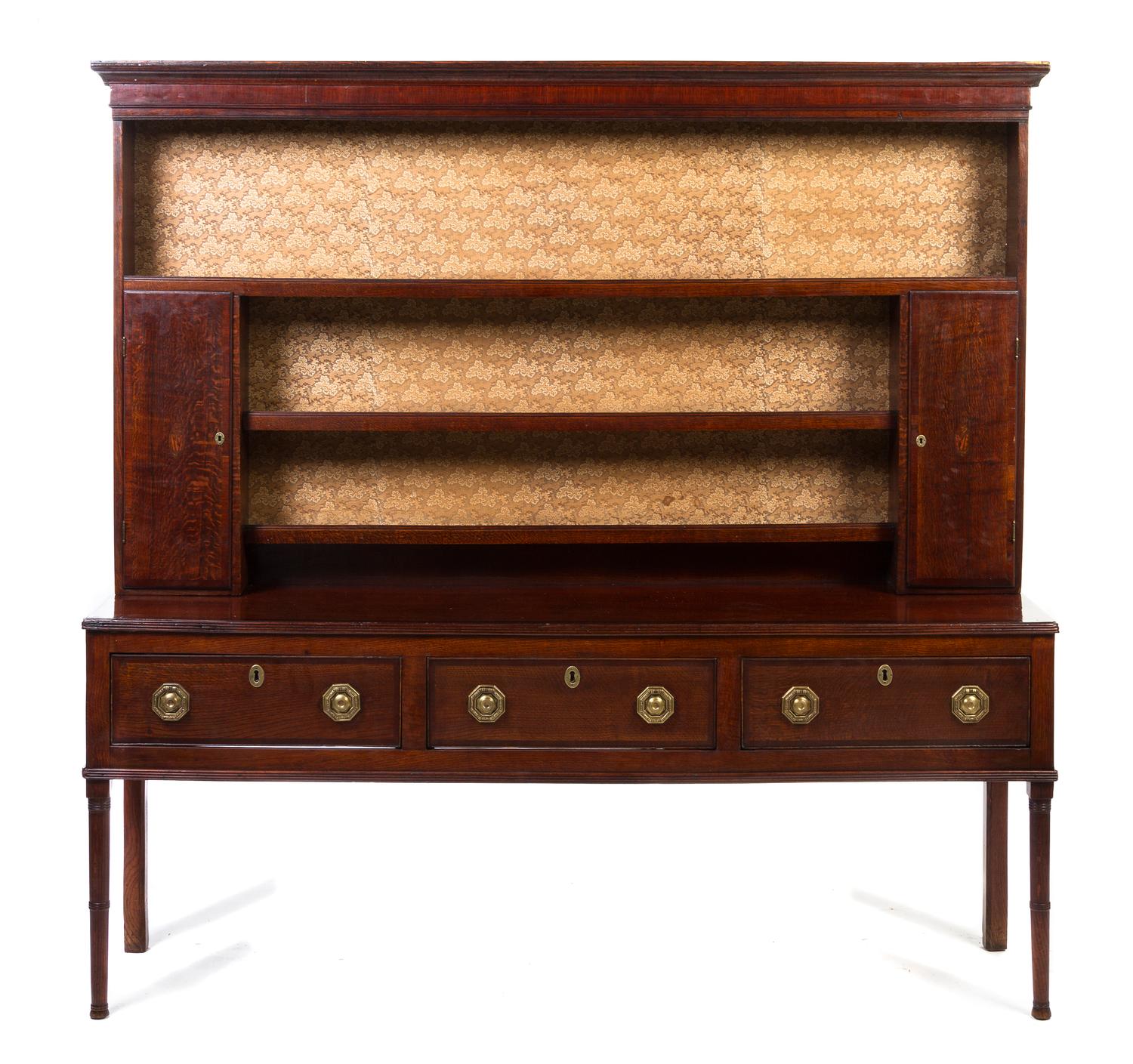 An Oak Welsh Cupboard, Height 71 3/4 x width 72 3/4 x depth 17 3/4 inches.