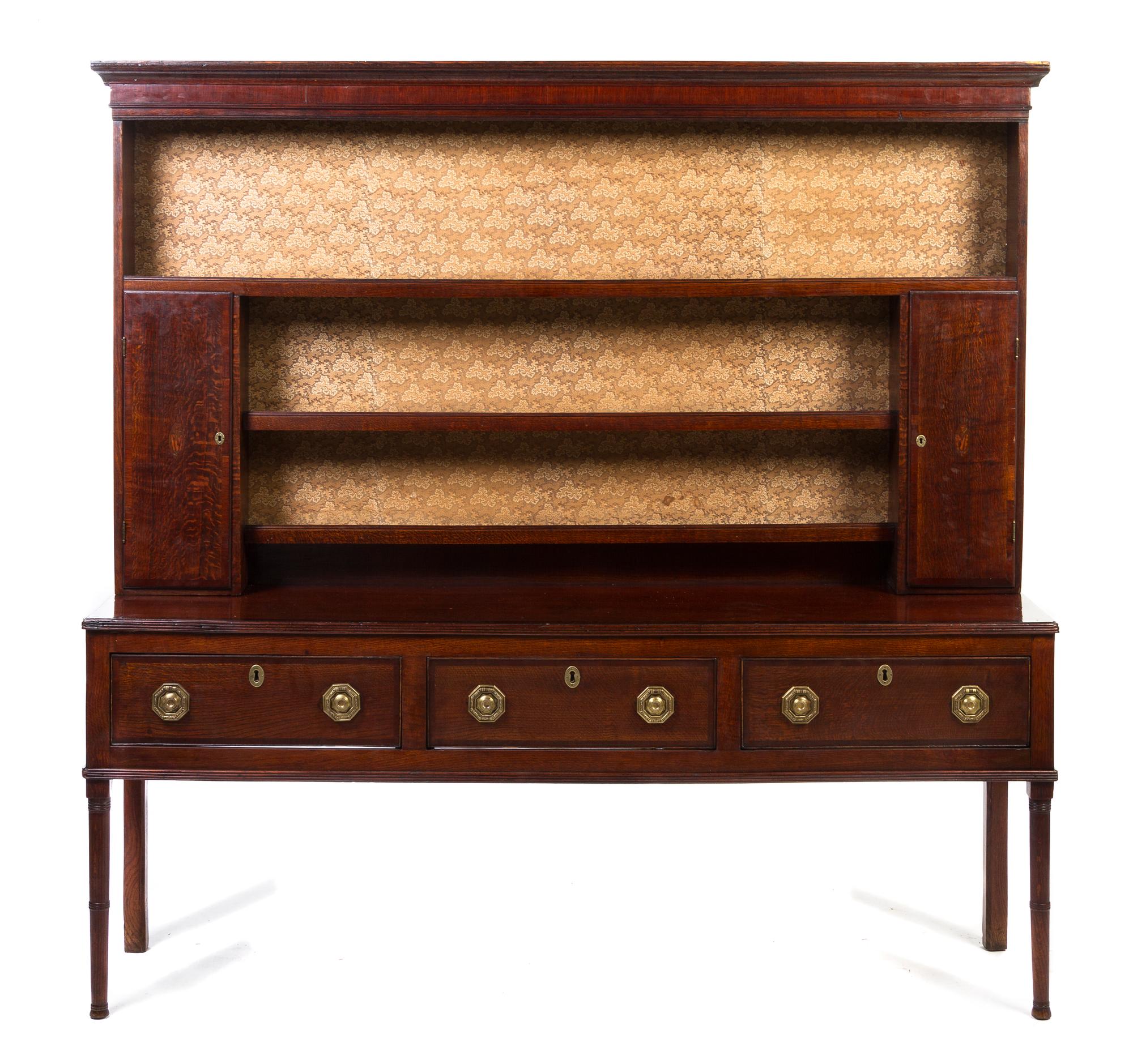 An Oak Welsh Cupboard, Height 71 3/4 x width 72 3/4 x depth 17 3/4 inches.