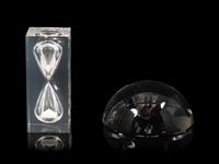 A Ralph Lauren Acrylic Clark Hourglass and a Glass Clayton Dome Paperweight