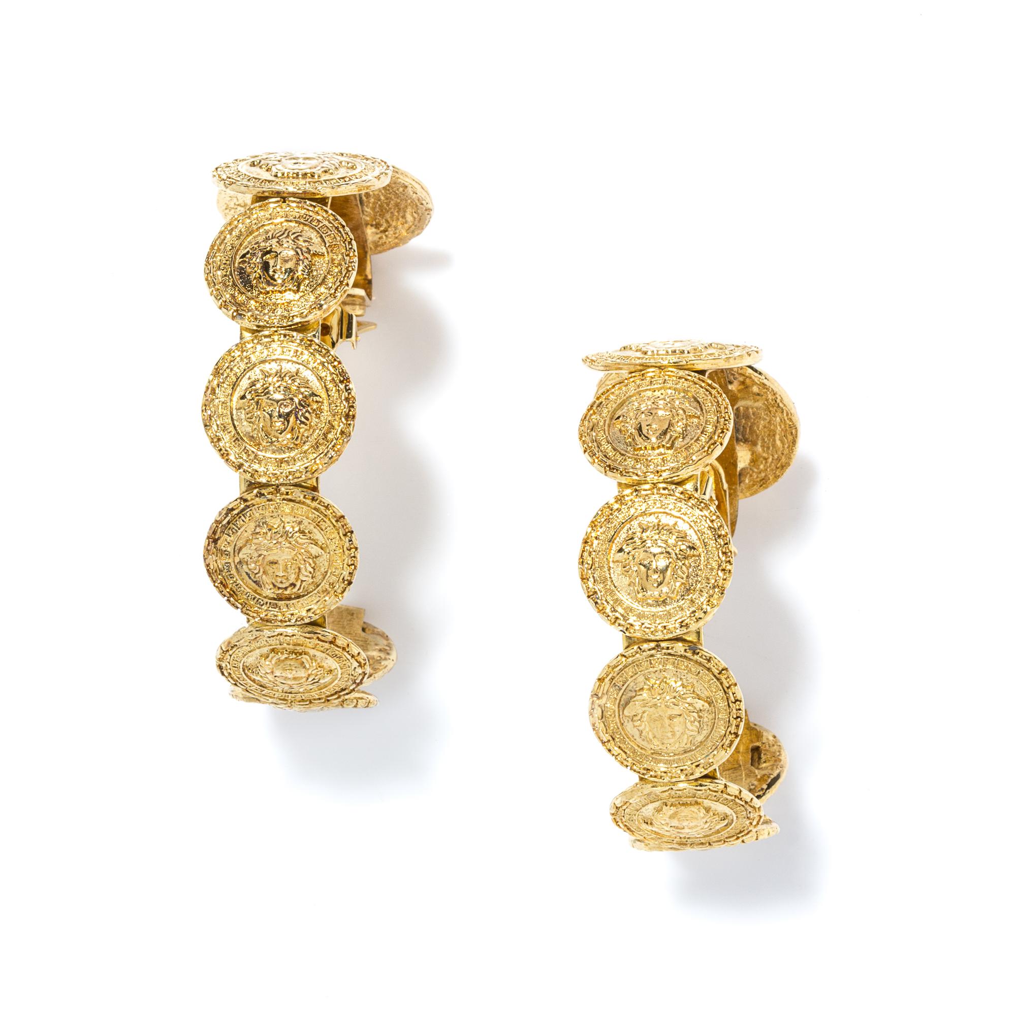 A Pair of Gianni Versace Medusa Hoop Earclips, 2.5" x 2.5".