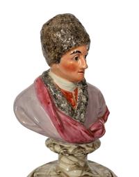 A Pair of French Faience Busts of Voltaire and Rousseau